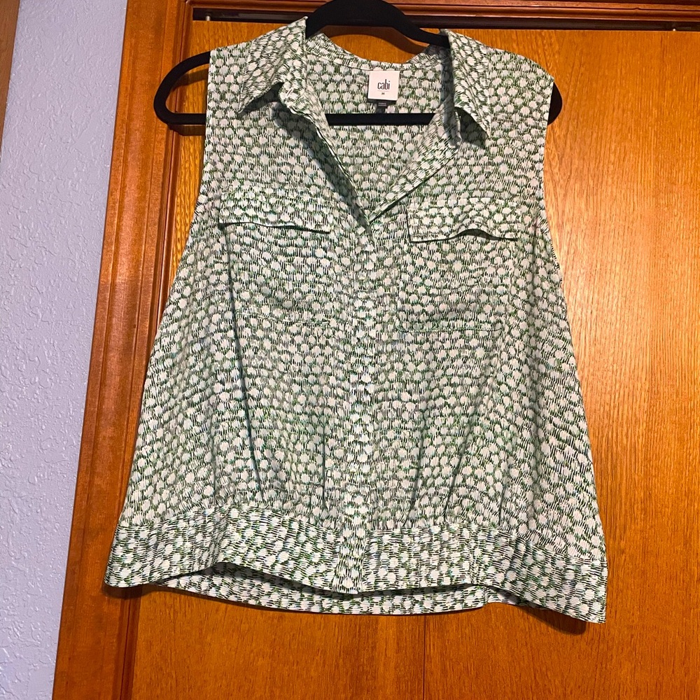 Cabi sleeveless top band on bottom button front.